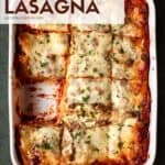lasagna in white pan.,