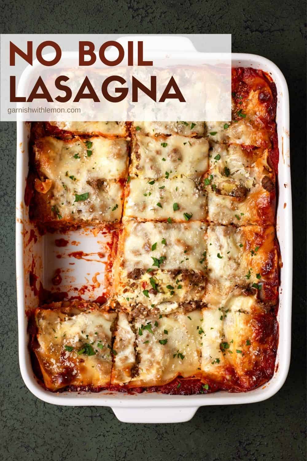 lasagna in white pan.,