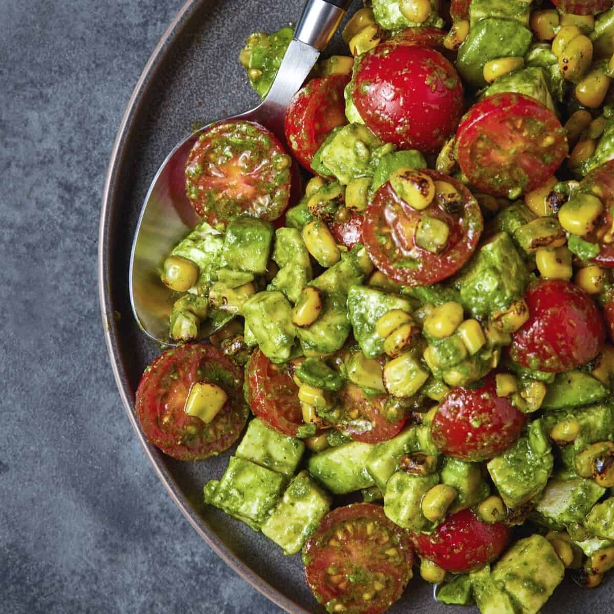 Tomato, Mozzarella and Grilled Corn Salad in a bowl.