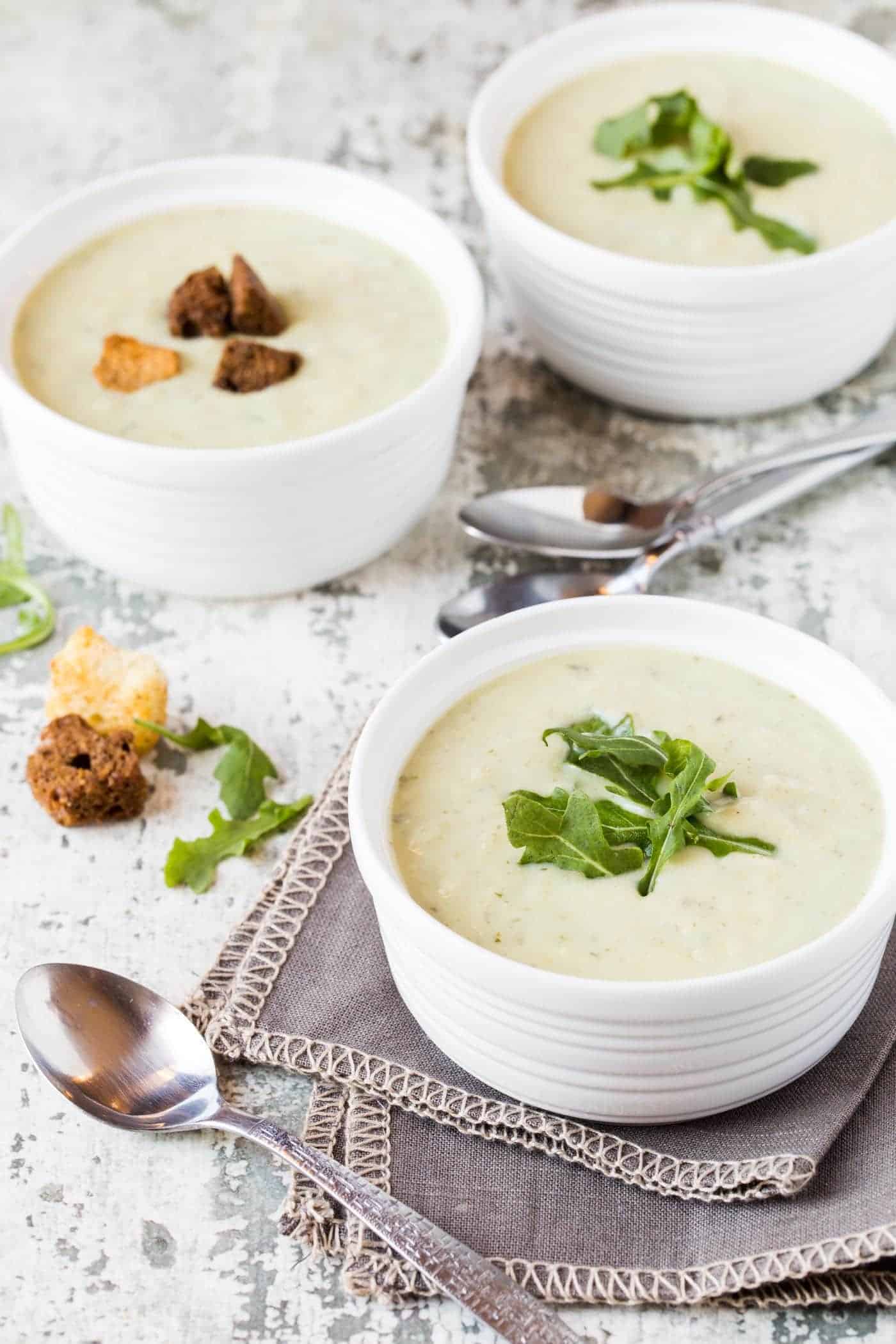 Roasted Potato Leek Soup with Arugula - Garnish with Lemon