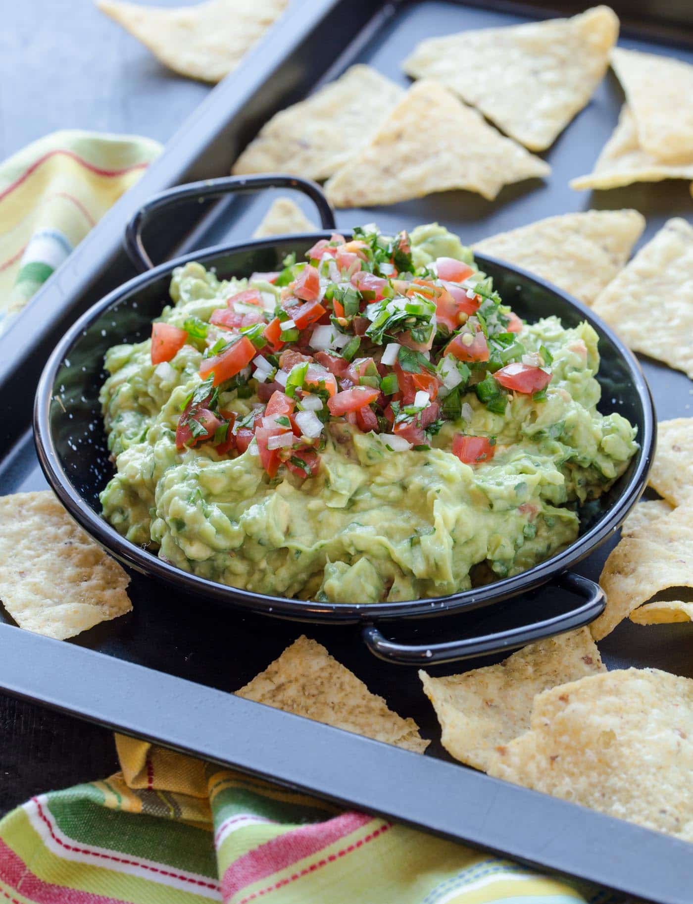 A plate of Guacamole and pico.