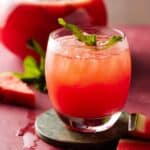 watermelon punch in low ball glass.