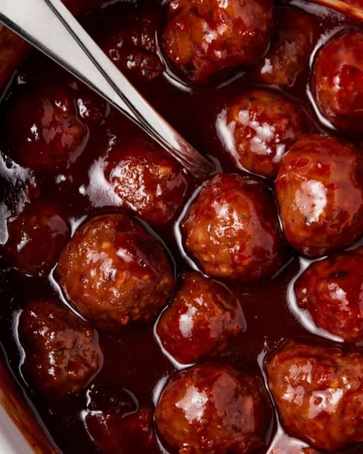 Meatballs in sauce in slow cooker.