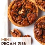 mini pecan pie with fresh pecans.