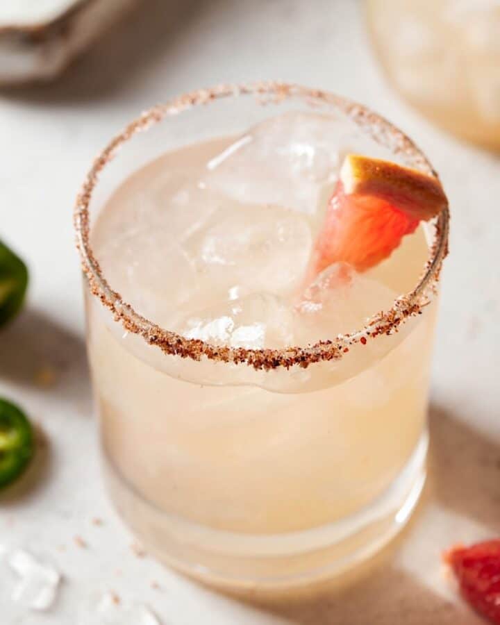 Grapefruit Margarita in a chili rimmed lowball glass.