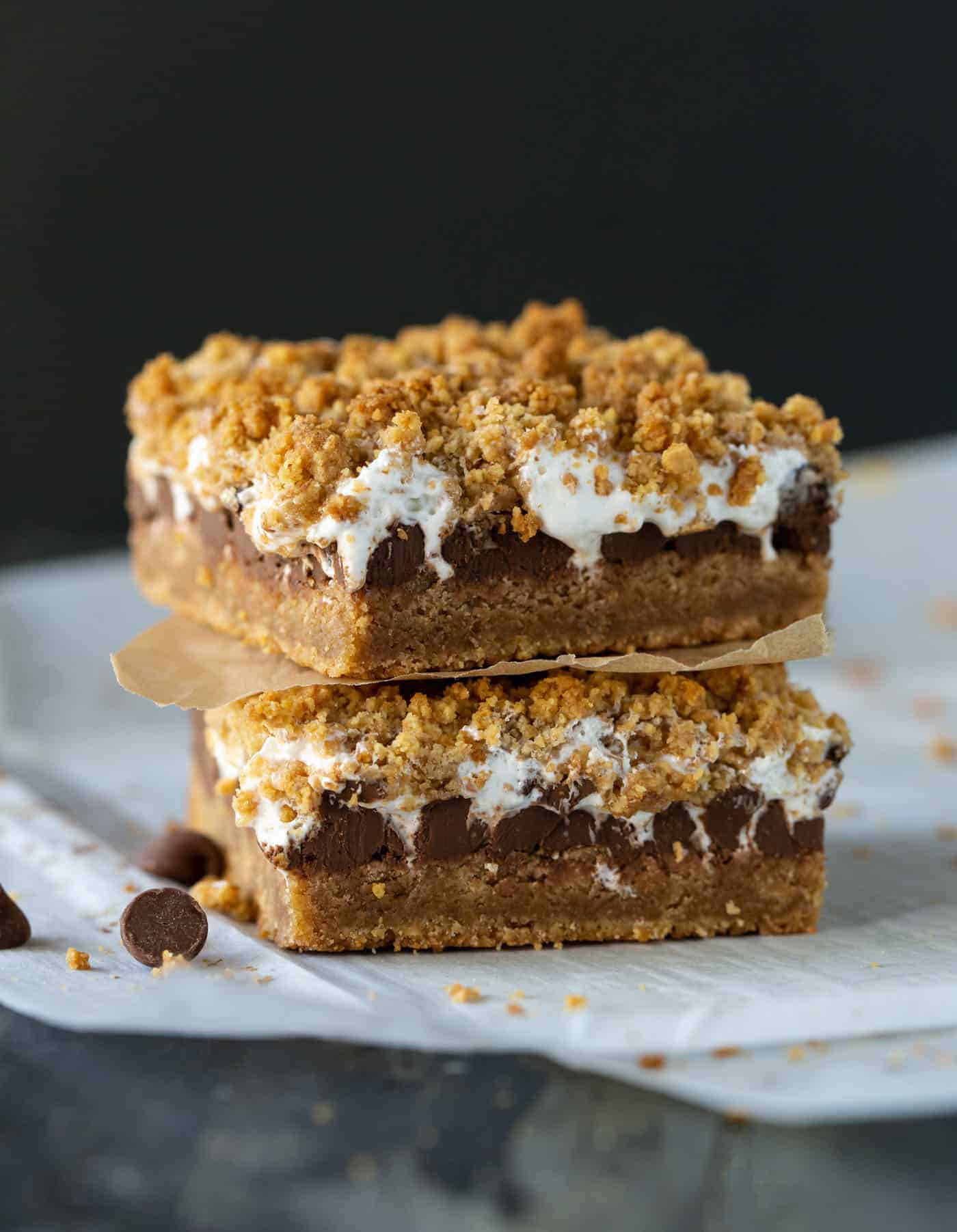 Two Gooey Baked S'mores Bars on top of each other.
