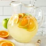 pitcher of lemonade with fruit.