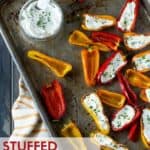peppers on sheet pan with cheese and herbs.