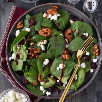 spinach salad on plate.