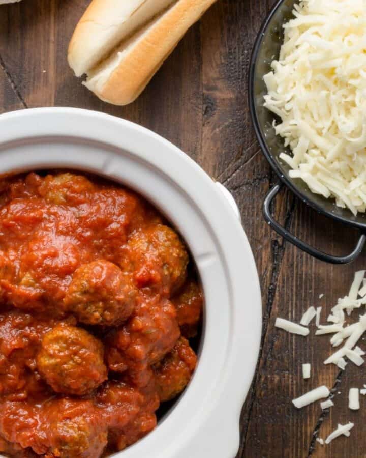 meatballs in slow cooker with cheese.