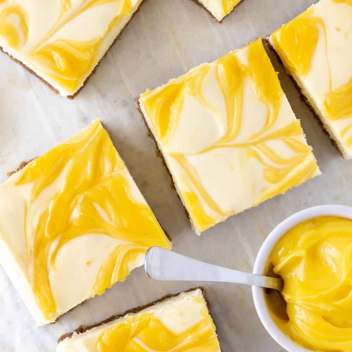 Luscious Lemon Cheesecake Bars - Garnish With Lemon