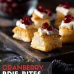 pastry bites on board with cranberries.