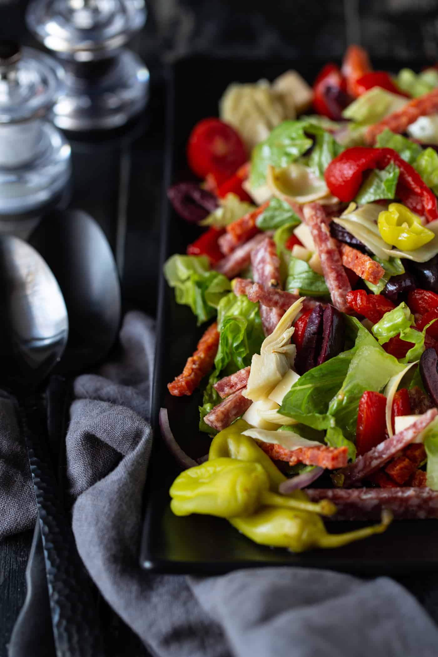 A close up of  Salad and Antipasto.