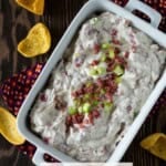 Chipped Beef dip in white dish with fritos.