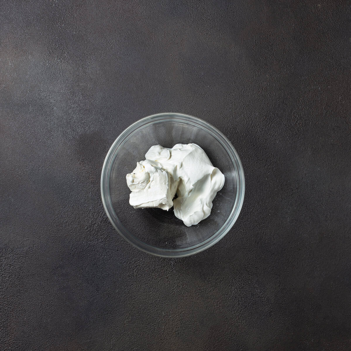 Sour cream and cream cheese in bowl.