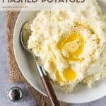 mashed potatoes in bowl with spoon.