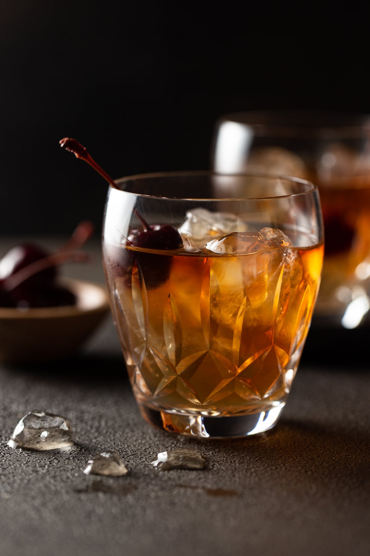 A close up of a manhattan in crystal glass.