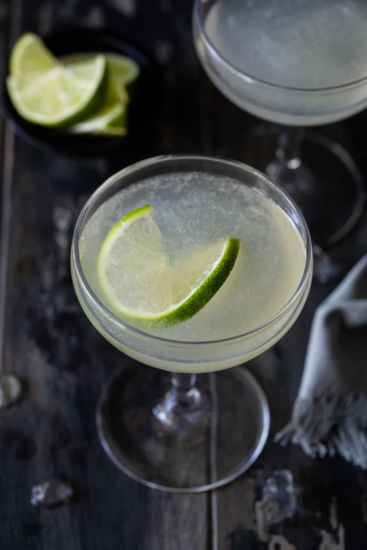 ¾ angle of 2 coupe glasses filled with daiquiri drinks