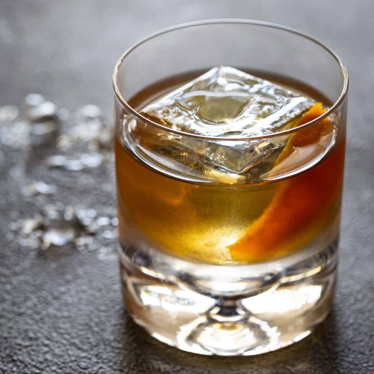 A glass of old fashioned drink.