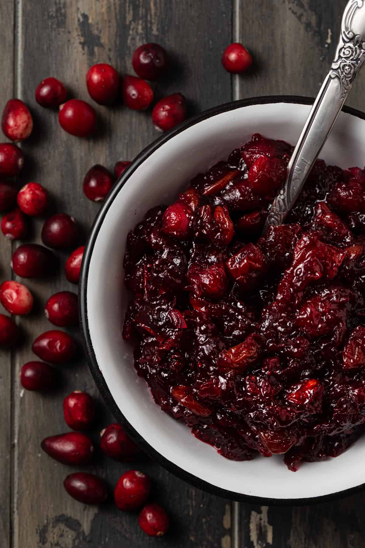 White bowl filled with cranberry sauce.