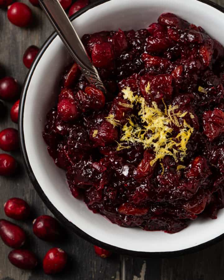A bowl of cranberry relish with cranberries.