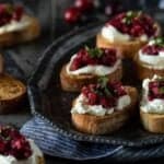 cranberry salsa on bread with cream cheese.