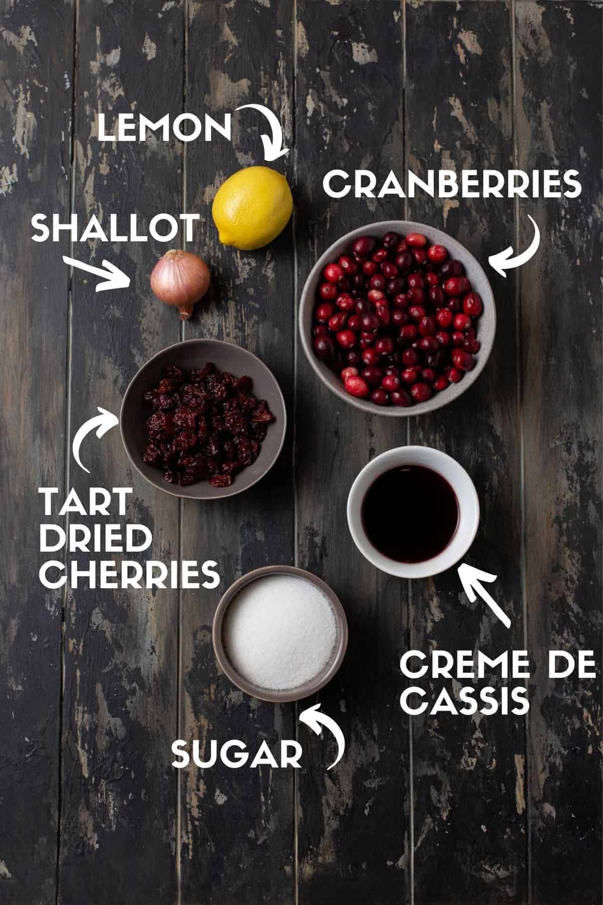 Fresh cranberries, creme de cassis, dried cherries, sugar, shallots and lemon ingredients for cranberry sauce.