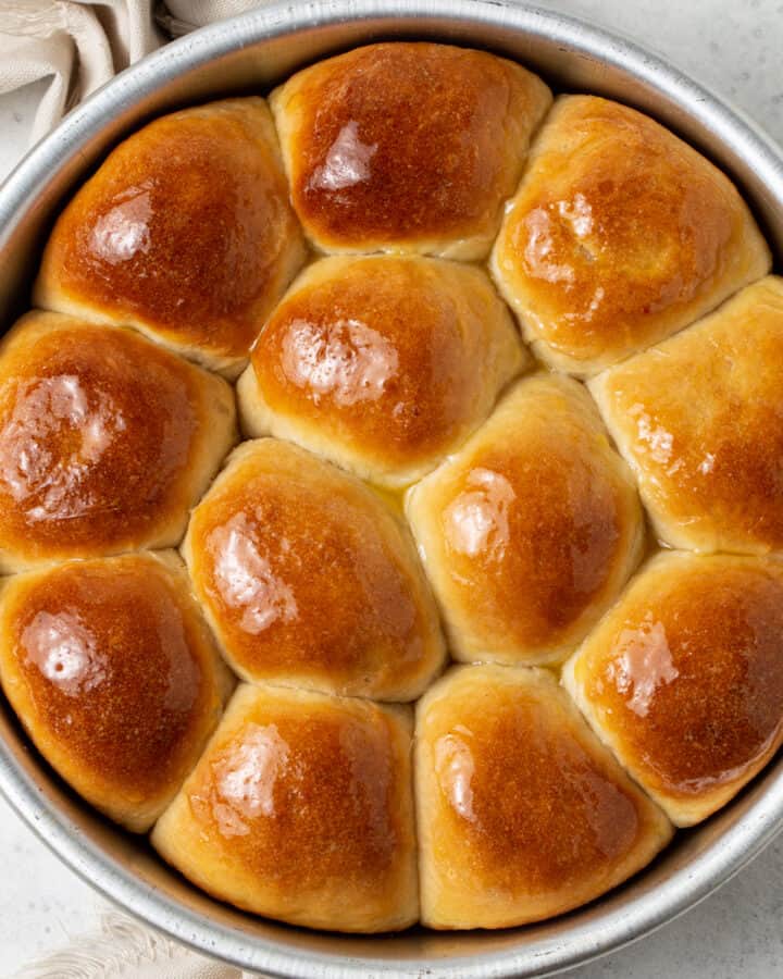 A pan of potato rolls on a table.