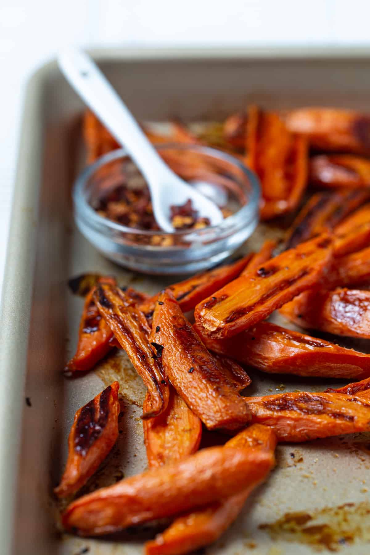 Roasted carrots on a sheet pan. 