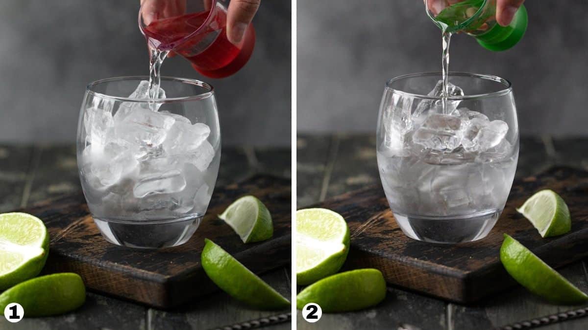 Hand pouring gin and elderflower liqueur into an ice filled lowball glass. 