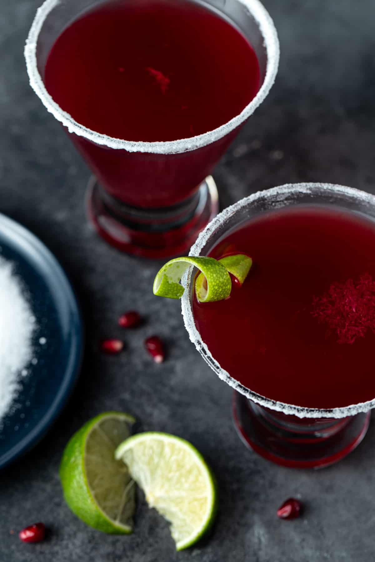 A close up shot of cocktail in rimmed martini glass. 