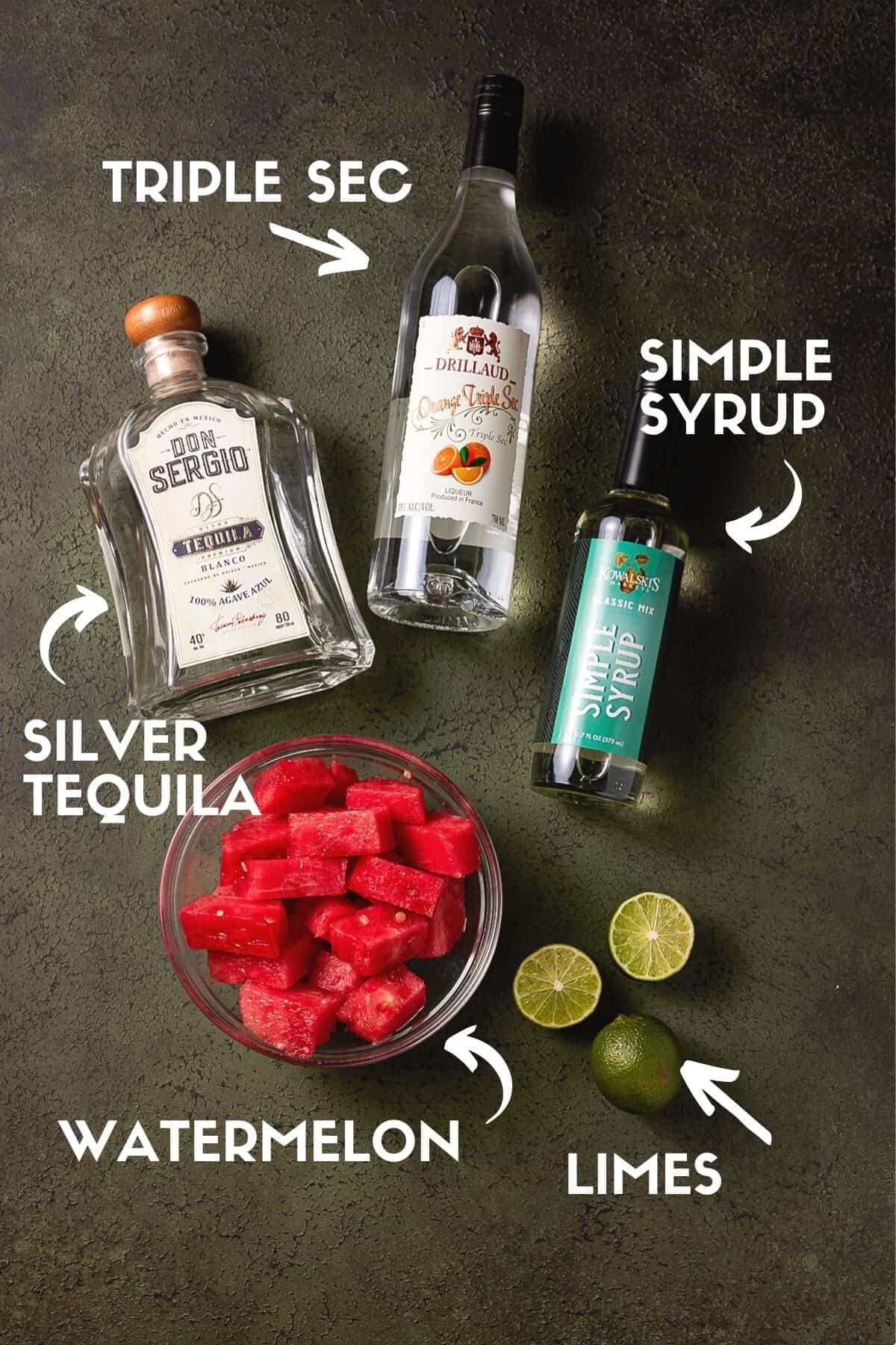 Watermelon Margarita ingredients including silver tequila, triple sec and lime juice. 