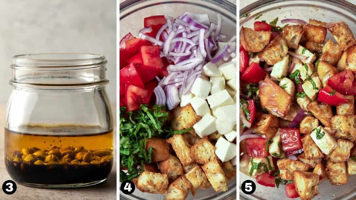 A mason jar filled with dressing and bread salad ingredients in a glass bowl. 