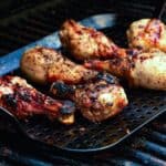 chicken legs on grill.
