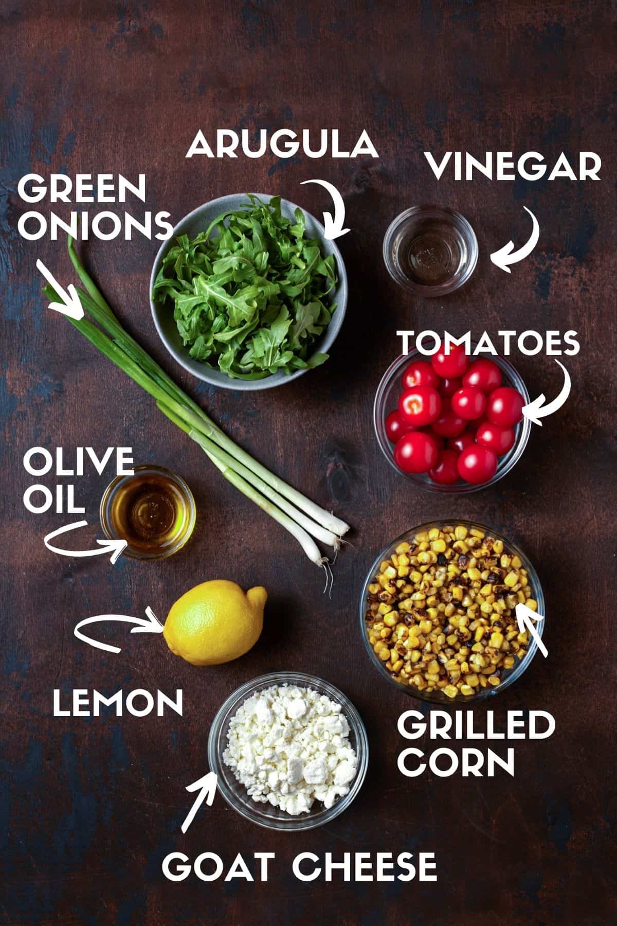 Ingredients for arugula, corn and goat cheese salad.