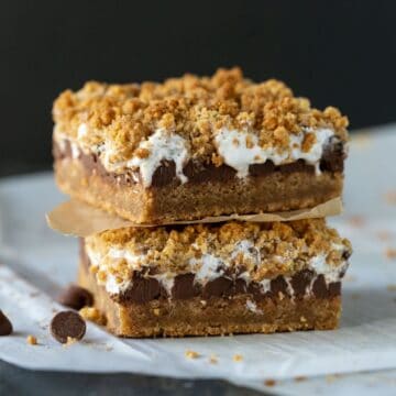 Two gooey smore's bars stacked on top of each other.