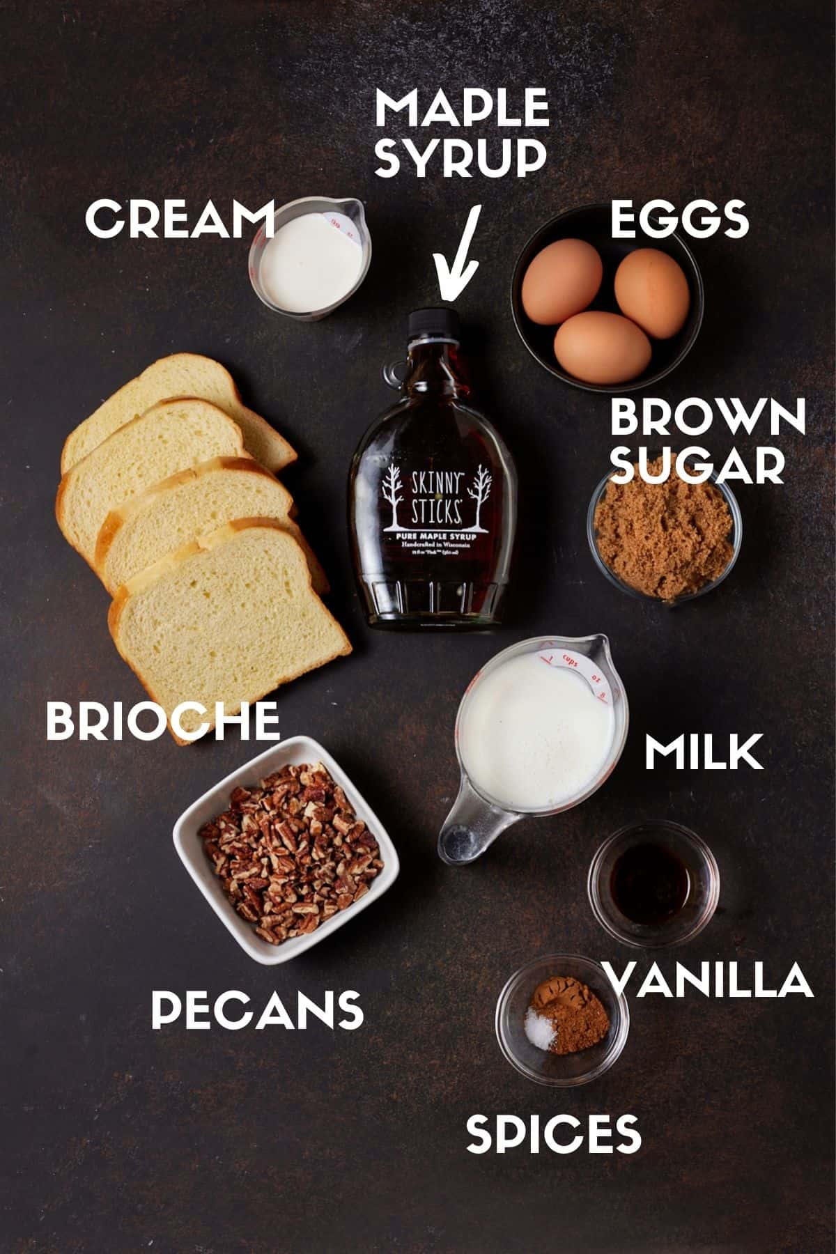 Ingredients for brioche french toast recipe including brioche bread, brown sugar, milk, eggs and pecans. 