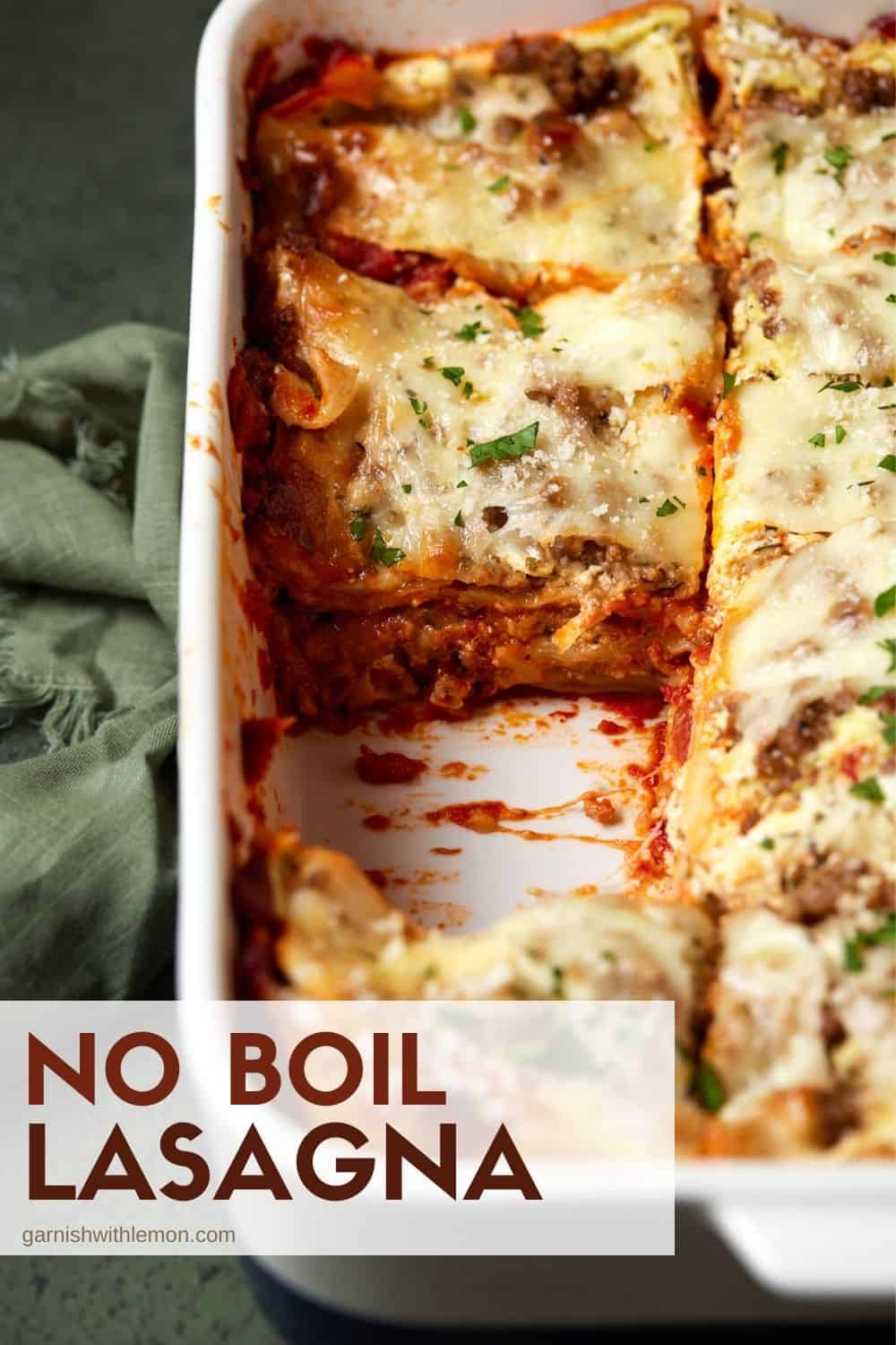 Baked lasagna with a slice cut out.