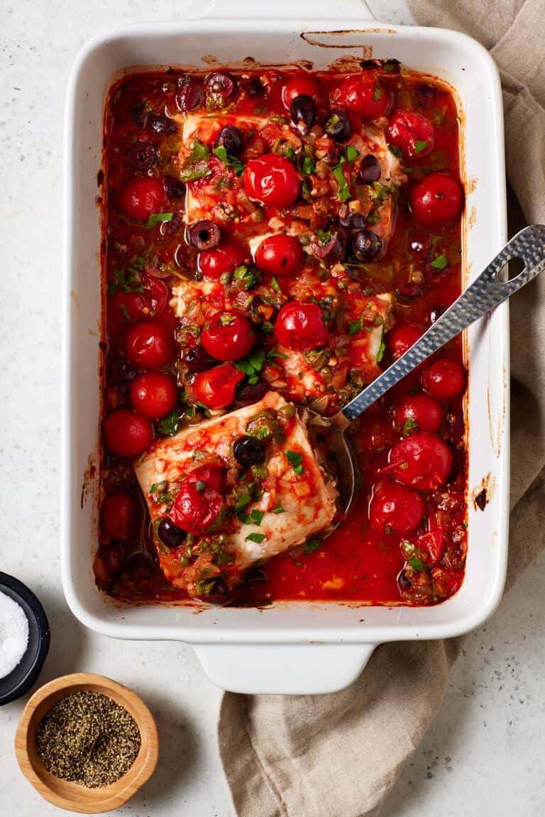Baked Mahi Mahi Recipe with Tomatoes & Olives Garnish with Lemon