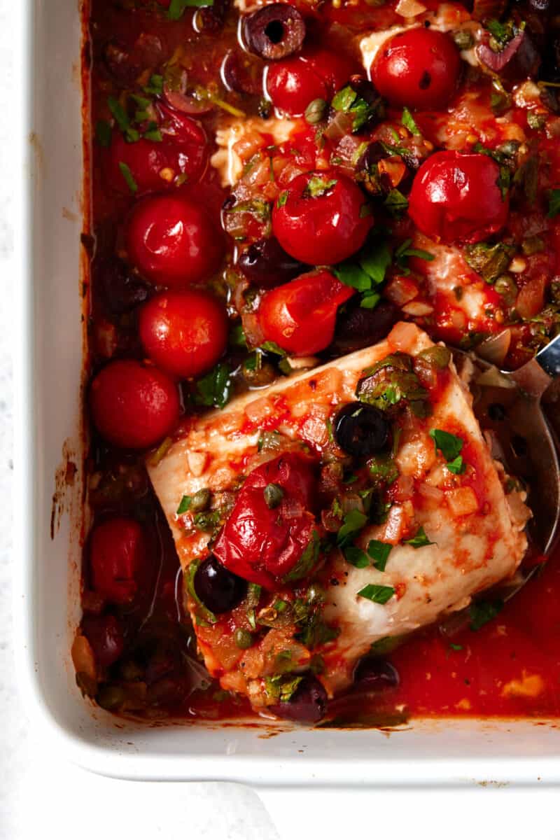 Baked Mahi Mahi Recipe with Tomatoes & Olives - Garnish with Lemon