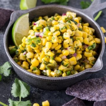 roasted corn salsa with lime wedge.