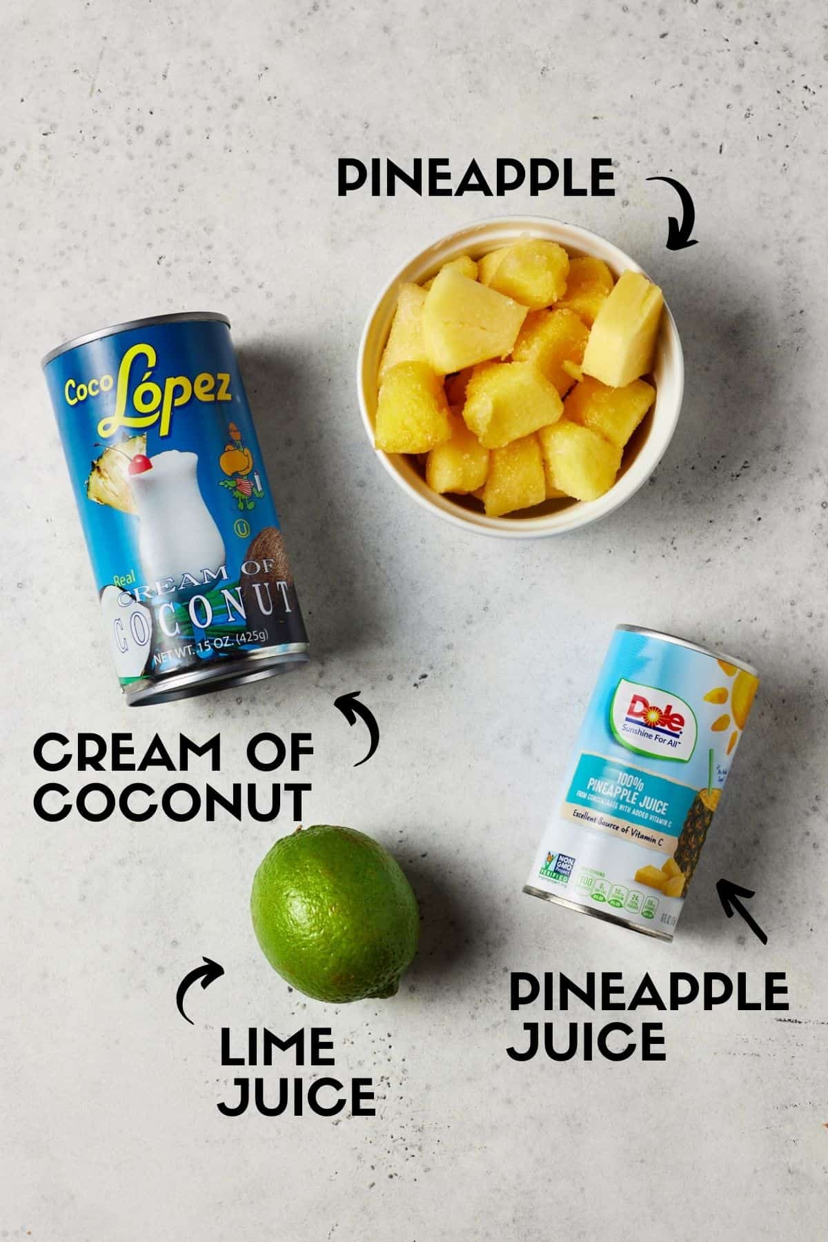 Cans of cream of coconut and pineapple juice for virgin piña colada recipe. 