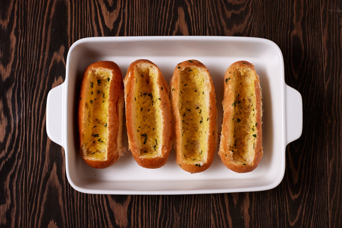 Toasted hoagie rolls brushed with garlic butter. 