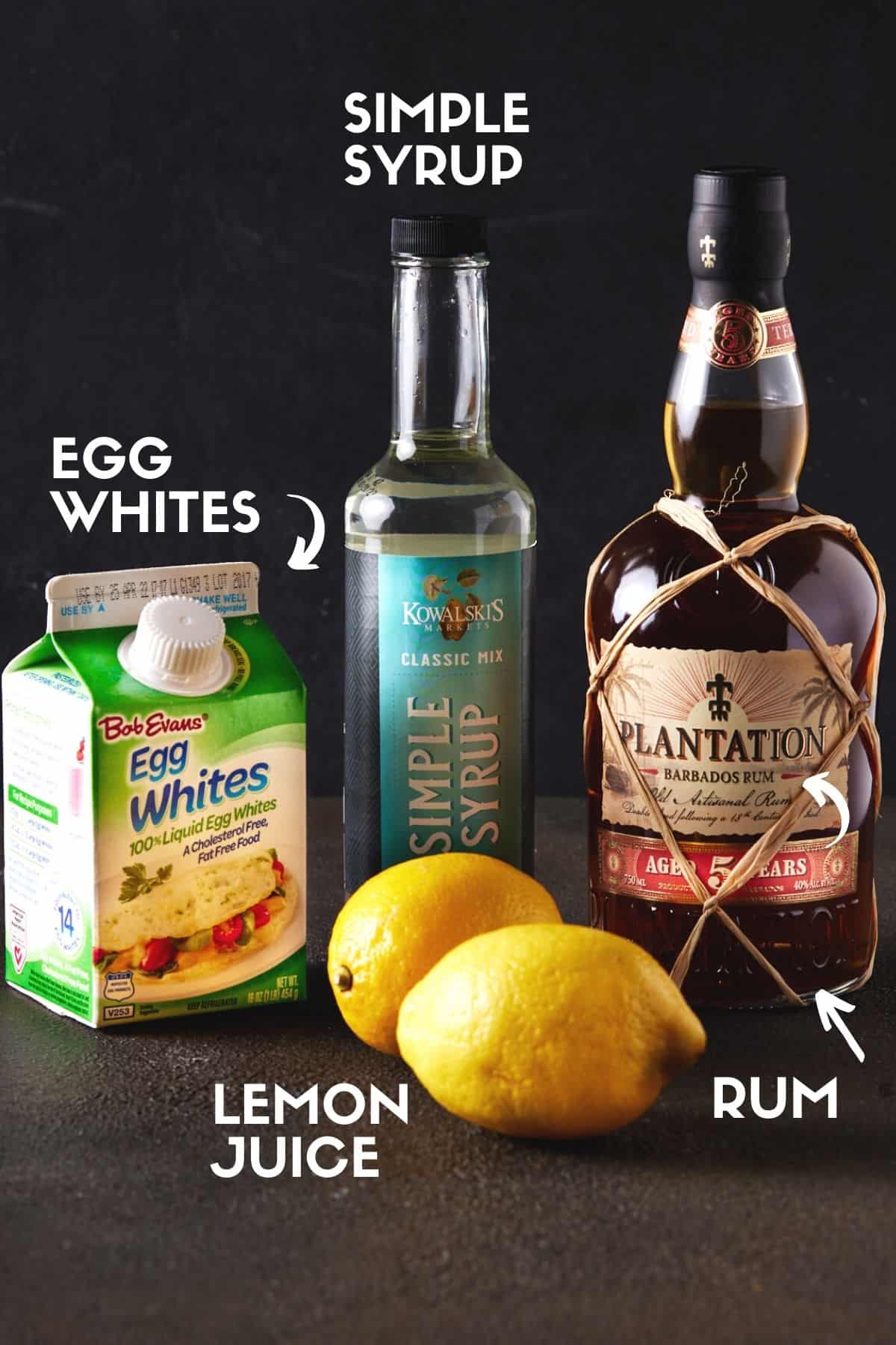 Bottles of ingredients needed for rum sour.
