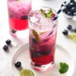Blueberry mojitos with fresh mint.