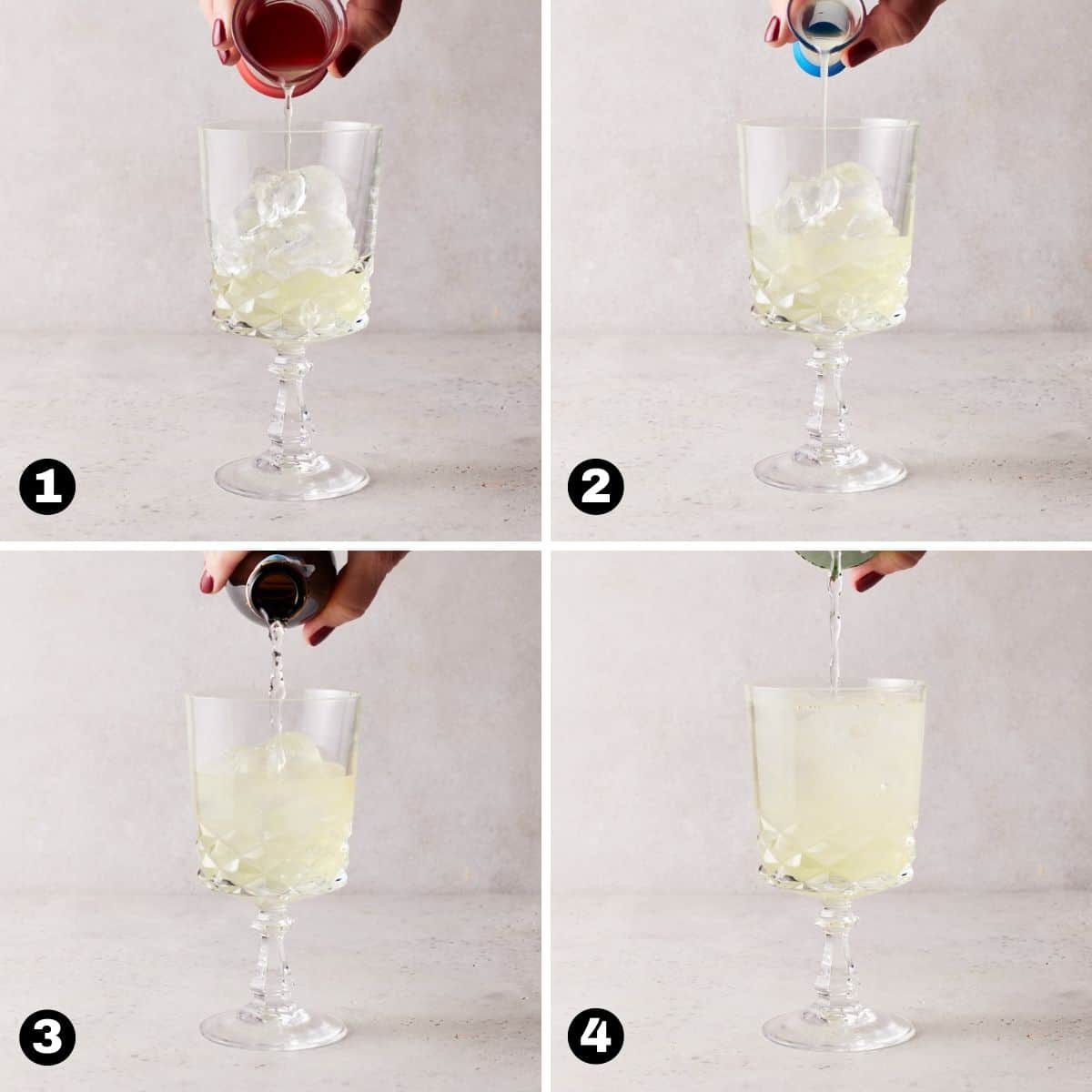 Hand pouring ingredients into ice filled glass for Limoncello Spritz. 