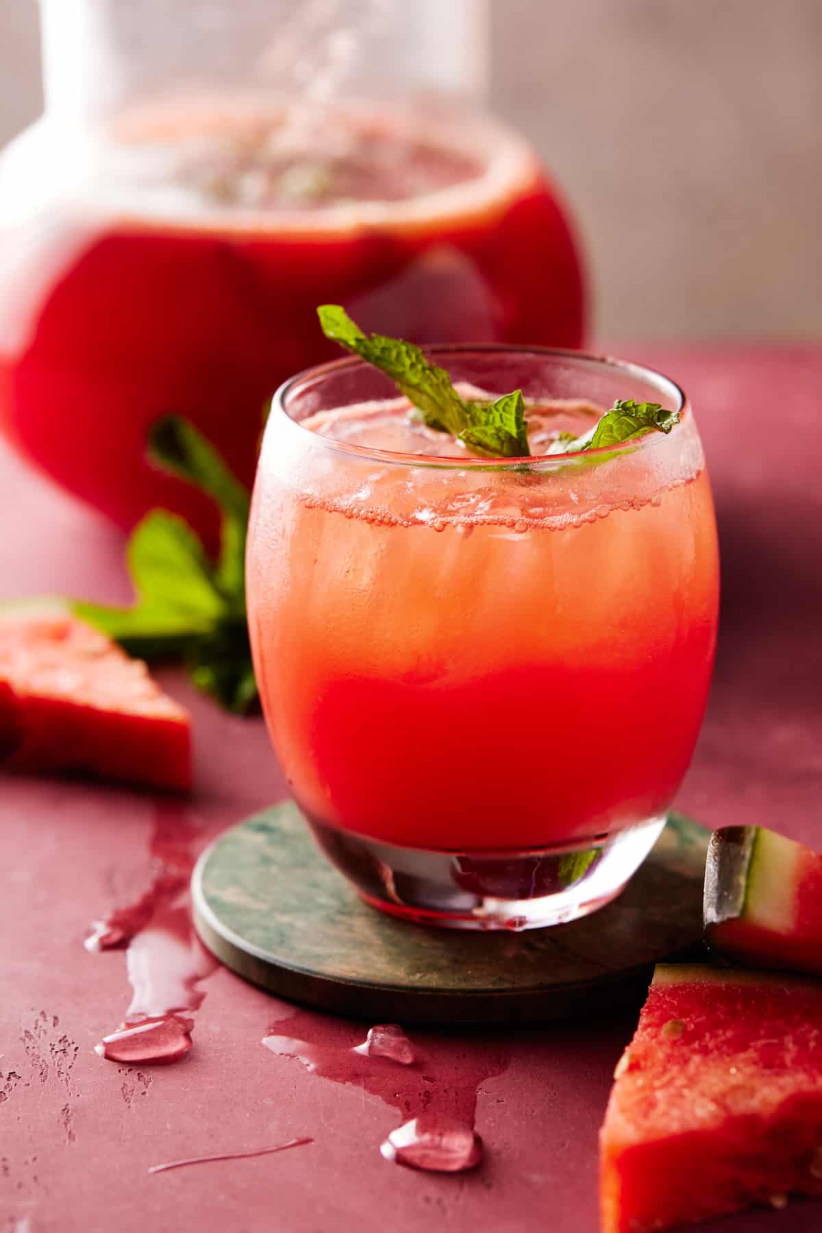 Punch in a low ball glass with fresh mint for garnish.