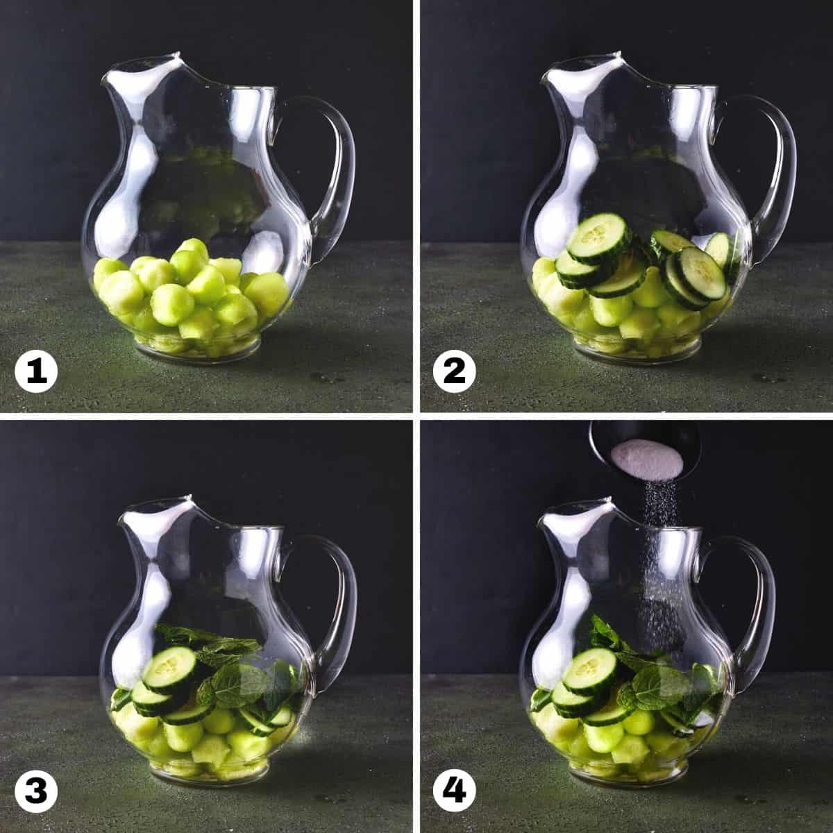 Hand putting melon, cucumber, mint and sugar into glass pitcher. 