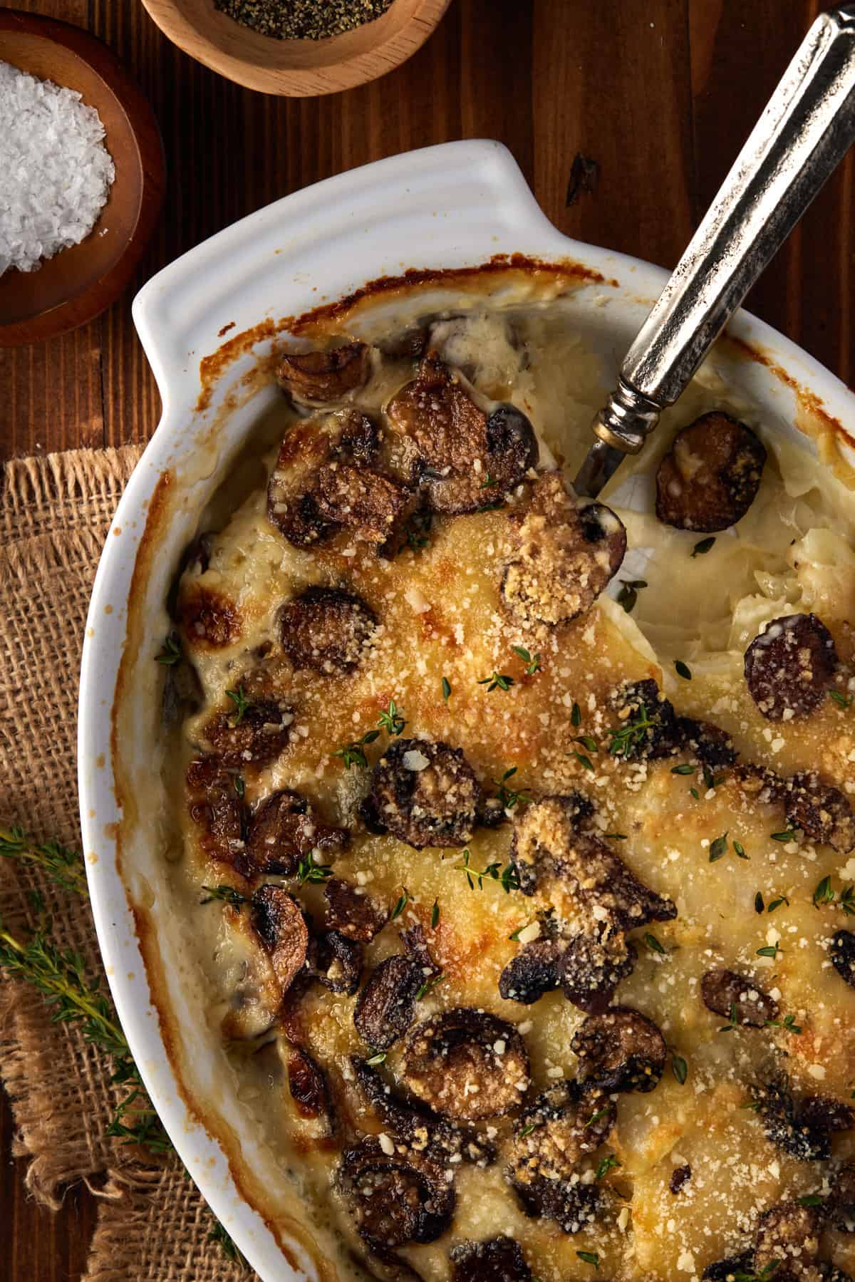 Potatoes, mushrooms and cheese baked in a gratin dish.