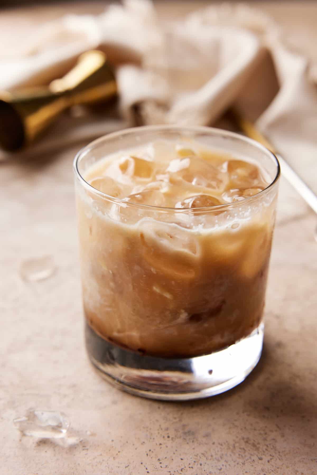 Stirred Kahlua White Russian in lowball glass with ice.